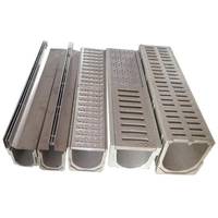 Caniveau de drainage en béton polymère haute résistance U150 avec grille en fonte pour voie publique extérieure classe de charge D400