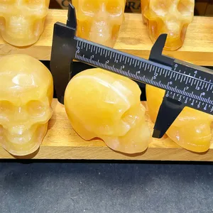 Wholesale High Quality Head Honey Iceland Natural Crystal Carving Yellow Calcite Skulls For Healing Decoration