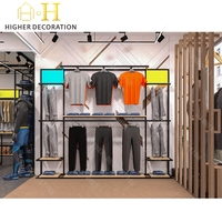 Conception d'intérieur de magasin unique et professionnelle pour les magasins de vêtements pour hommes, décoration de magasins de vêtements et de chaussures pour hommes, designs pour les boutiques de vente au détail