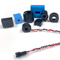 Mini transformateur de courant alternatif 5A/2.5mA noyau nanocristallin 0.1% précision conducteur primaire intégré de petite taille pour l'induction