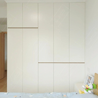 Armoire Cloud White Écologique Grande Capacité avec Portes Segmentées Sans Cadre et Poignées Intégrées pour Maison Moderne
