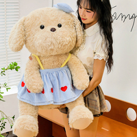 Peluche chien assis mignon avec robe à imprimé cœur, jouet en peluche doux pour filles, cadeau d'anniversaire pour enfants, décoration d'intérieur, vente en gros