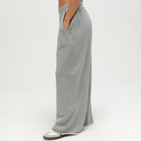 Pantalon de survêtement décontracté gris chiné taille basse à jambes larges pour femme, design moderne, avec volants à la taille et poches latérales, vente en gros