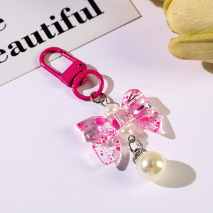 Nouveau Pendentif en Acrylique Couleur Bonbon avec Nœud et Perle pour Accessoires de Téléphone Portable, Pendentif pour Écouteurs, Porte-clés, Vente en Gros - Product Image 3