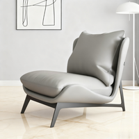 Fauteuil lounge en cuir minimaliste italien, style nordique décontracté pour petit salon ou balcon
