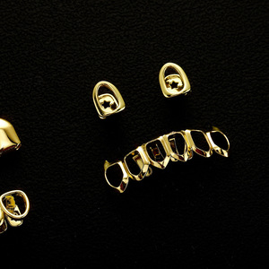 Grillz para dientes, juego de grillz dorados con forma de púa, aleación de cobre, unisex, accesorio de moda hip hop para fiestas - Product Image 1