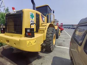 รถเกรดเดอร์ล้อยาง CAT 950H มือสอง ยี่ห้อญี่ปุ่น เกียร์ธรรมดา เครื่องยนต์และเกียร์บ็อกซ์เดิม สีเหลือง แท้ 100% ผลิตในญี่ปุ่น รุ่นปี 2022 - Product Image 4