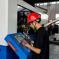 Machine de soufflage de préformes PET haute performance 6000 BPH, machine de fabrication de bouteilles en plastique pour l'eau, équipement de production automatique de bouteilles