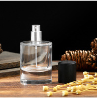Perfume Masculino de Alta Gama en Atomizador de 50 ml, Botella de Vidrio Transparente con Base Pesada, Tapa Cilíndrica Negra Pulida, Etiquetas Personalizables Completas
