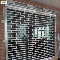 Porte de sécurité en acier inoxydable/aluminium Grill Roller Shutter Door for Mall