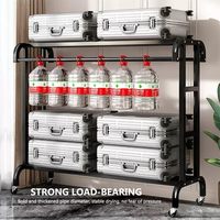Porte-vêtements à roulettes robuste en métal noir à double barre, avec barres de suspension doubles, roues verrouillables et étagère de rangement inférieure