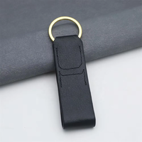 Porte-clés en sangle de nylon imprimée sur mesure avec languette en cuir cousue pour les marques de fitness, les articles promotionnels de gym et l'usage quotidien