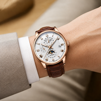 Montre de luxe pour homme à cadran en verre quartz, bracelet en cuir, boîtier en alliage, avec breloque lune ciel étoilé 20 mm et calendrier à trois aiguilles, livrée en coffret
