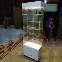 Vitrine rotative en verre personnalisée avec éclairage LED et serrure pour bijoux, montres, cosmétiques, accessoires de téléphonie mobile