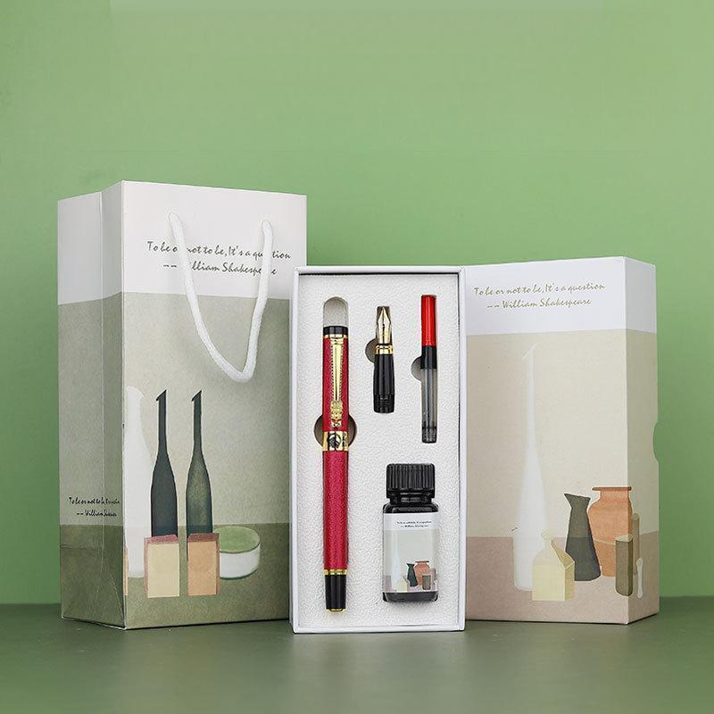 Stylo plume rouge + accessoires plume apparente