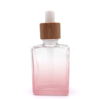Vente en gros de flacons compte-gouttes en verre rose dégradé de luxe avec bouchon en bambou pour huile essentielle cosmétique, sérum, 30 ml, 50 ml, 100 ml