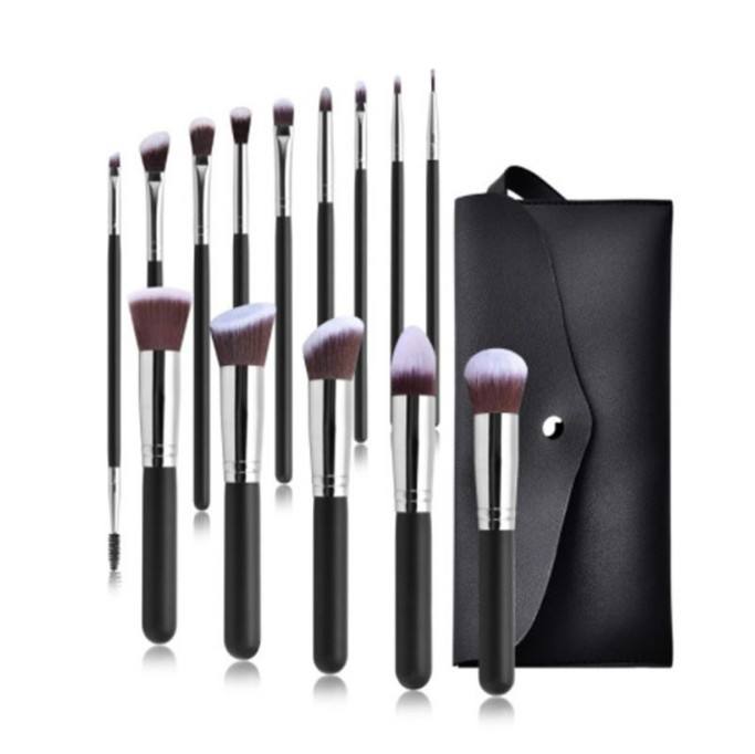 silver makeup brush with bag
