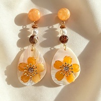 Kaimei bijoux de mode Beach Resort Style Long Shell Tassel Boucles d'oreilles avec des boules de riz à la main peintes à la bombe Boucles d'oreilles en coquille de mer