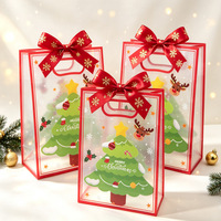 Sac cadeau de Noël transparent en PP avec poignée, sac d'emballage pour bonbons de Noël, sac de shopping pour cadeaux de Noël, vente en gros d'emballages de Noël