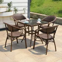 Silla de ratán/mimbre de alta calidad para café francés, conjunto de mesa, muebles populares para jardín al aire libre