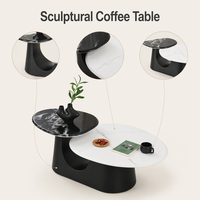 Juego de Mesa de Centro para Sala de Estar Global Export Avant Garde, Diseño Asimétrico de Pétalos, en Blanco y Negro, Dos Niveles, Panel de Vidrio y Piedra Tecnológica