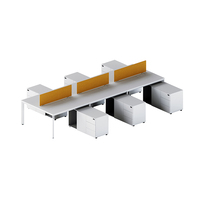 Bureau de travail ergonomique moderne en bois blanc, conception modulaire à assembler, supportant une station de travail informatique pour deux personnes, idéal pour le partage entre collègues.