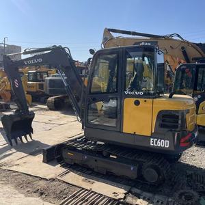 Excavatrice sur chenilles Volvo EC60DL d'occasion, 6 tonnes, moteur Deutz, modèle 2025, bon état, faible nombre d'heures de travail, capacité de la cuvette de 0,3 m - Product Image 1