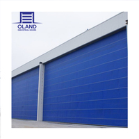 Porte de hangar pliante motorisée industrielle OLAND en tissu PVC coupe-vent, garantie 1 an pour hangar d'avions