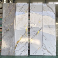 Divers styles de feuilles de marbre artificielles en PVC (polyvinyle chlorure) résistant aux UV, alternative au marbre, panneau mural décoratif stratifié SPC