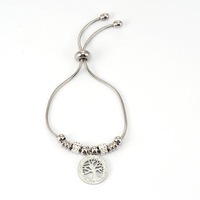 Bracelet élégant en acier inoxydable avec perles en cristal en forme de cœur et croix sertie de diamants en acier titane pour femmes