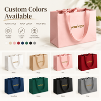 Sacs en papier carton ivoire personnalisés de luxe avec estampage à chaud doré et poignée en ruban pour boutiques de vêtements, bijoux et cadeaux