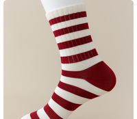 Chaussettes mi-mollet pour femmes en gros, chaussettes rayées d'automne et d'hiver, chaussettes en coton à nœuds
