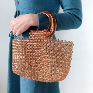 Individuelle 2024 neue handgewebte kaffee-handtasche einfaches retro-acryl damen runde handtasche hohl gemüse korb haken