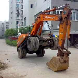 Excavateur sur pneus Hitachi EX100WD d'occasion Hitachi Pelleteuse sur pneus Pelleteuse sur pneus Hitachi d'occasion à vendre - Product Image 1