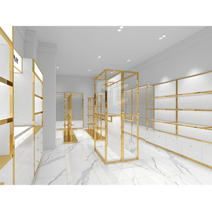 Décoration de magasin de vêtements haut de gamme présentoir de vêtements en or personnalisé fourni conception de magasin de vêtements complète - Product Image 3