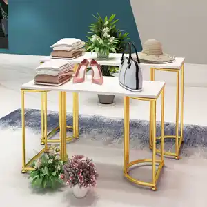 Fabbrica direttamente tavolo da esposizione del negozio di abbigliamento del tavolo da esposizione del metallo della mobilia del negozio di colore dell'oro