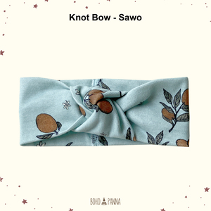 Adorable sapodilla knot bow with soft fabric secure fit and timeless elegance perfect for parties photos and everyday styling - Product Image 2