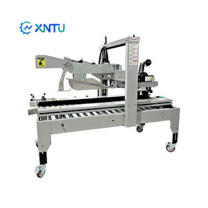 آلة ختم الصناديق عالية الجودة تعمل بشكل تلقائي بالكامل، تتميز بوضع السكون التلقائي، وتوفير الكهرباء وتتميز بكفاءة في استهلاك الطاقة - Product Image 1