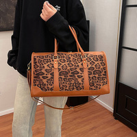 Haut de gamme femmes grande capacité Portable bandoulière imprimé léopard sac à bandoulière à la mode tout match deux poignées fermeture éclair pour voyage