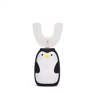 企鹅儿童牙刷器和杯具电动360牙刷自动声波卡通电池供电的ABS + 硅胶儿童