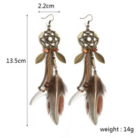 Boucles d'oreilles pendantes en alliage de zinc faites à la main, style bohème vintage européen et américain, avec franges de plumes, forme de feuille, cadeau pour femme, ivoire, art rétro