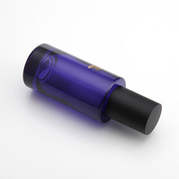 Flacon pompe pour fond de teint en verre à épaule plate bleu foncé de 100 ml de haute qualité avec bouchon noir mat