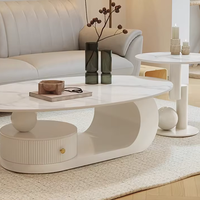 Table basse créative de style crème, ovale, pour petit appartement, style italien minimaliste, plateau en roche, table à thé