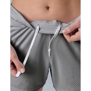 Shorts de sport en mesh pour femme FOXA, entrejambe 5 pouces, coupe ample, à enfiler avec poches zippées, vêtements de fitness - Product Image 4