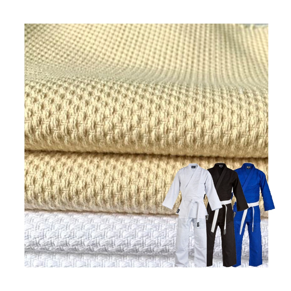 OEM ODM GRS resistente al desgarro Jiu Jitsu Gi Kimono tela perla tejido 450GSM 100% algodón lejía blanco Judo Gi tela