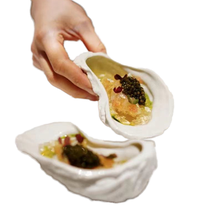 Plats en céramique de fruits de mer blancs Offre Spéciale Assiette créative en forme d'oursin rond pour technique gravée de restaurant et d'hôtel - Product Image 1