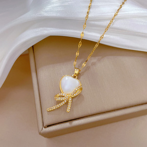 Colar de <span class=keywords><strong>laco</strong></span> mignon brillant diamant incrustation nœud collier 18K plaqué or chaîne en acier inoxydable oeil de chat pierre coeur arc collier - Product Image 5