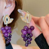 Boucles d'oreilles tendance en laiton plaqué or 18 carats avec zircon violet en forme de fleur et pompon, bijoux de luxe légers haut de gamme pour femmes