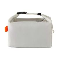 Cooler Caddy (Sac isotherme souple en polyester de 10 litres, doublure imperméable, ouvre-bouteille intégré, se plie à plat)