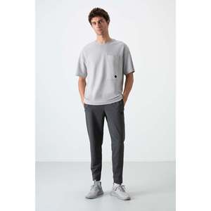 กางเกงวอร์มผู้ชาย Tommylife ทรงสบาย เอวยางยืด ระบายอากาศได้ดี สีแอนทราไซต์เมลันจ์ - Product Image 5